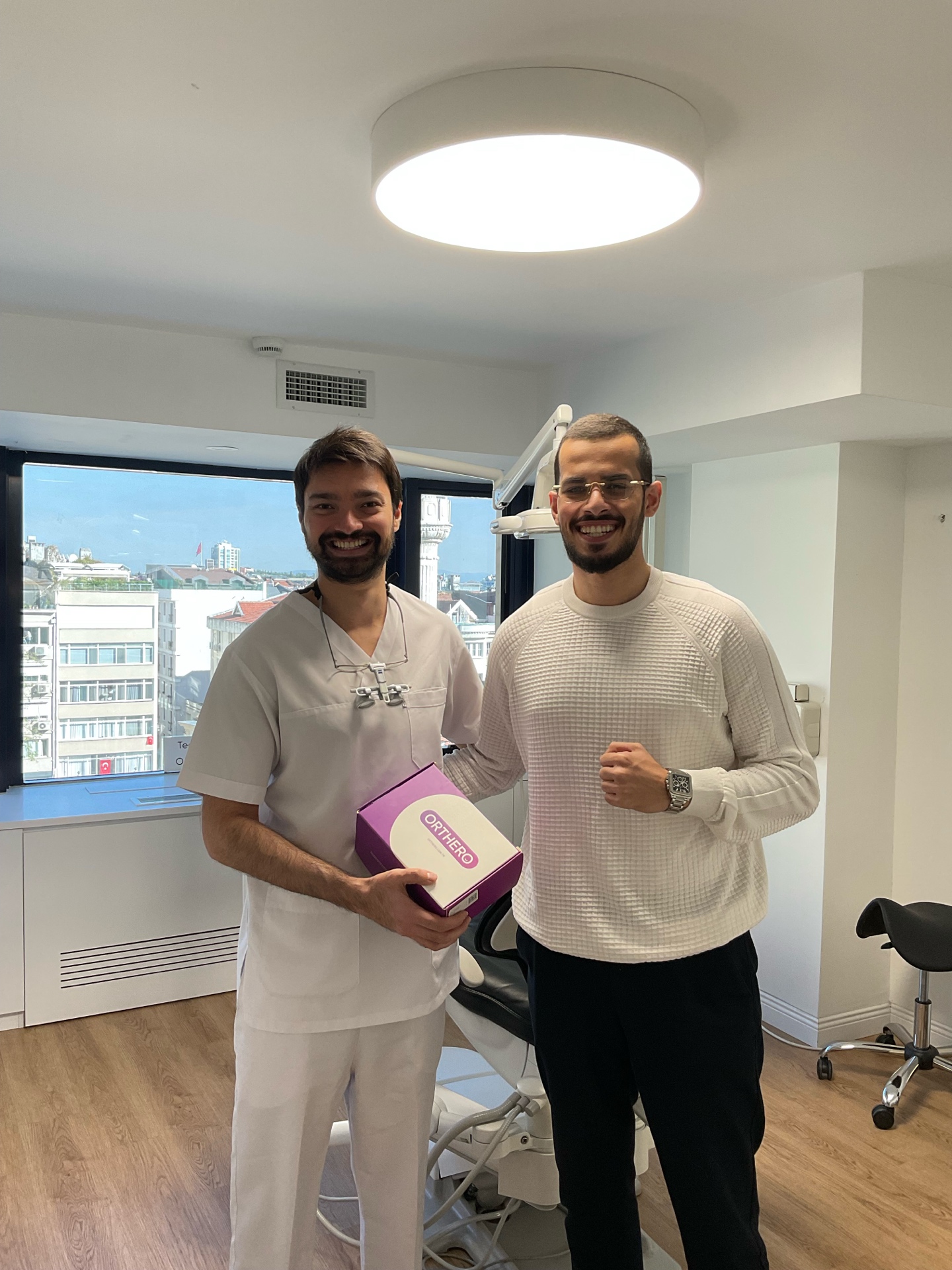 Happy Invisalign Patient with Dr. Akmurat